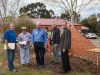 Kenwick rotary club president Ron Mildenhall, project coordinator Steve Weychan, Amaroo care services property and assets manager John Hansen, Gosnells men’s shed chairman Geoff Wiltshire and Gosnells RSL president Stuart Holmes joined forces to help build a commemorative wall, which was still under construction. Photograph — Matt Devlin.