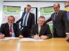 Local Government Minister Tony Simpson and Rivers Regional council chief executive Alex Sheridan witness City of Gosnells mayor Dave Griffiths and Rivers Regional council chairman Ron Hoffman signing the contracts for the alternative waste treatment facility. Photograph — Matt Devlin.