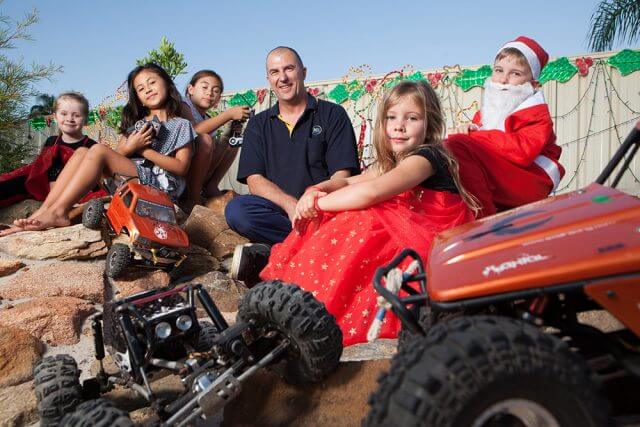 Clare Campbell, Ruby, Jade and Darren Duncan, Sarah Upton and Jamie Campbell with the RC rock crawlers. Photograph — Matt Devlin.