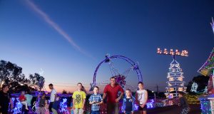 The Bailey’s grandchildren including 18-month-old Havana, eight-week-old Jordan, Emily, 9, Ella Jane, 5, Sophie, 2, Dylan, 11, and Noah, 7, enjoy the lights. Photograph – Matt Devlin.