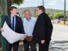 Federal Member for Canning Andrew Hastie, Shire of Serpentine Jarrahdale chief executive Richard Gorbunow and shire president John Erren inspect plans for the duplication of Abernethy Road. Photograph — Matt Devlin.