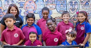 Parkwood Intensive English Centre deputy principal Letchme Paul with students who will be involved in the multicultural festival celebrations. Photograph — Kelly Pilgrim-Byrne.