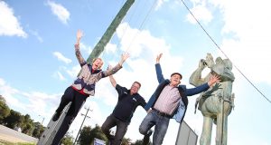 Byford Progress Association president Colleen Rankin, Shire of Serpentine Jarrahdale president John Erren and artist Len Zuks welcome traffic inspector Charlie Knox back to his old post on South Western Highway. Photograph — Matt Devlin.