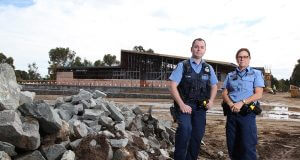 Acting senior sergeant Bron Umbras and first class constable Colleen Grey check the progress at the new Mundijong police station. Photograph — Matt Devlin.