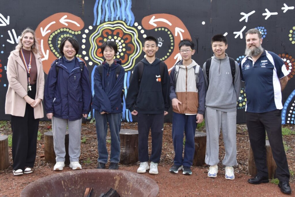 Chinese students pose for photo at SRC.