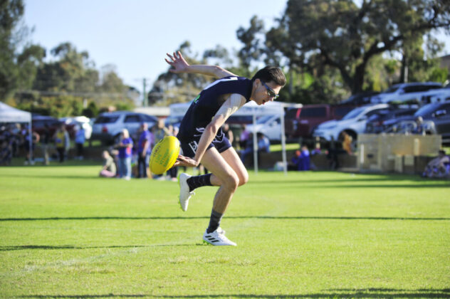 Player grabbing the ball.