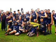 Aussie Rules premiership team photo after game.