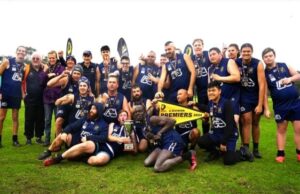 Aussie Rules premiership team photo after game.