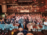 band in front of crowd.