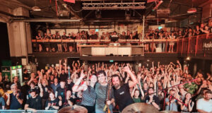 band in front of crowd.