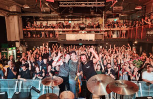 band in front of crowd.